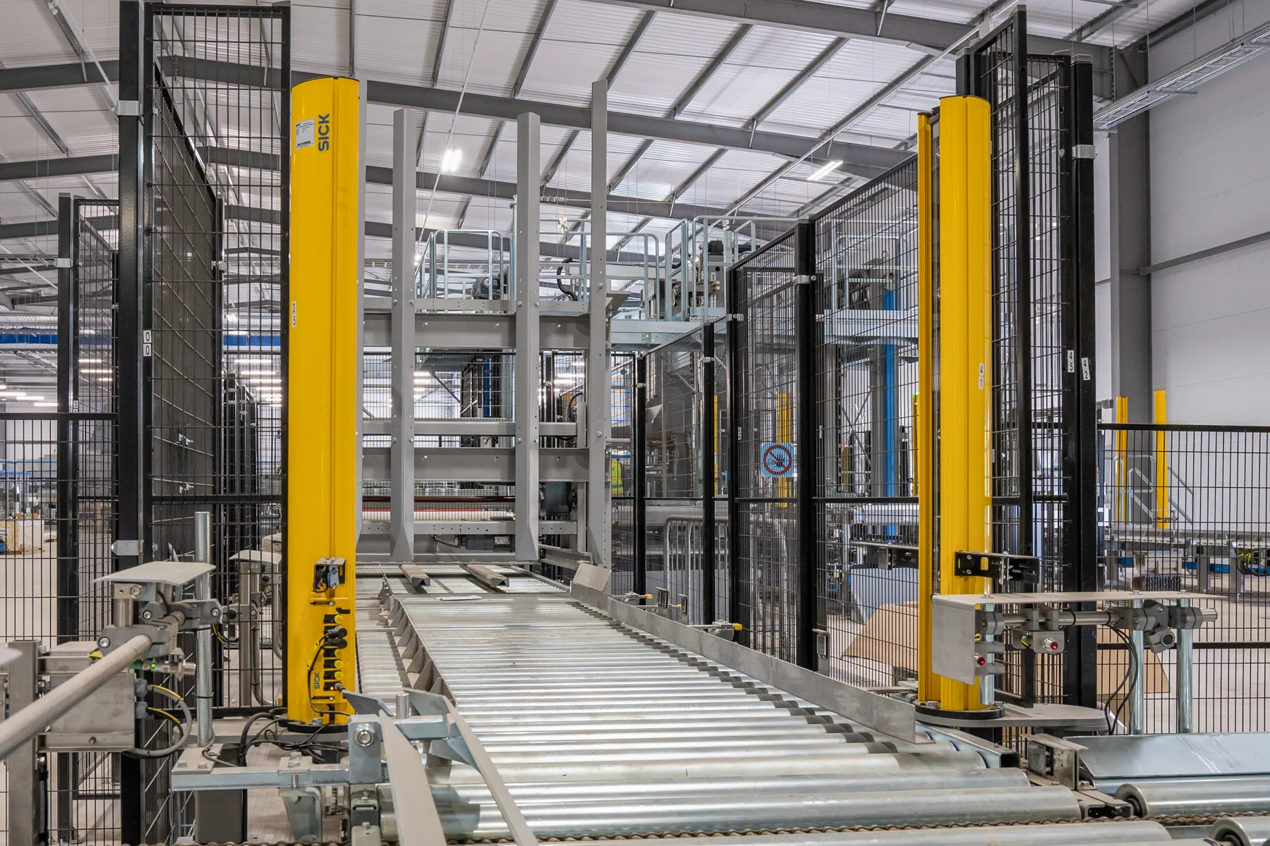 Jarvale-Construction-Roxane-Project-21 Industrial production equipment installation within warehouse environment