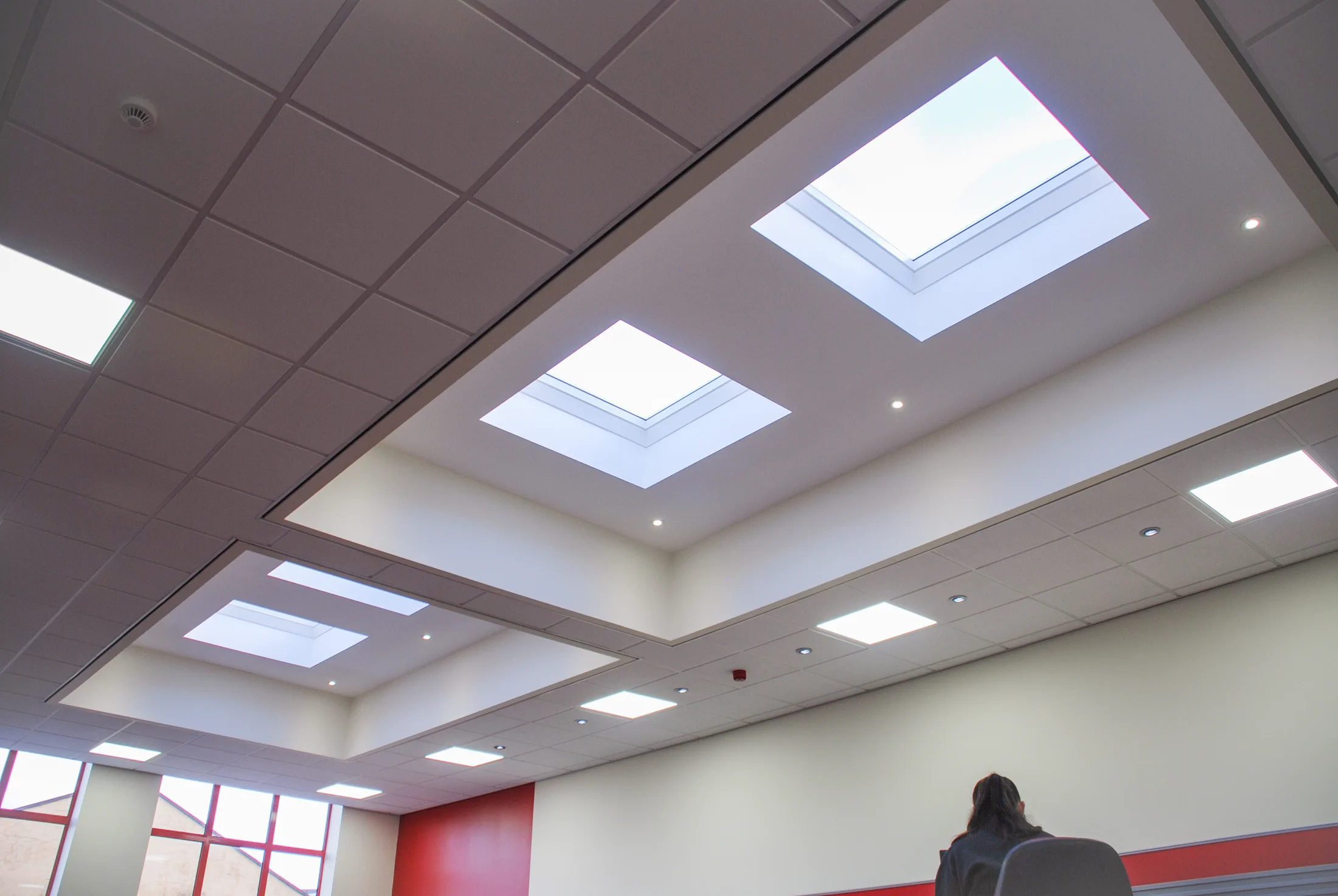 Jarvale-Construction-Special-Quality-Alloys-9 Commercial office interior featuring upgraded lighting and workspace improvements